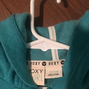 Brand new Roxy sweatshirt with tags. Size 10/12
